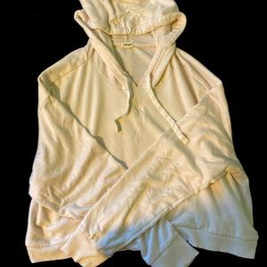 Off-white cropped garage hoodie. Soft texture.